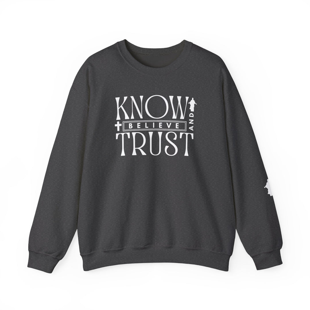 Trust, Know, Believe Crew sweatshirt, close-up of fabric texture and ribbed collar, showcasing casual style and comfort. Ideal for colder months, blending polyester and cotton.