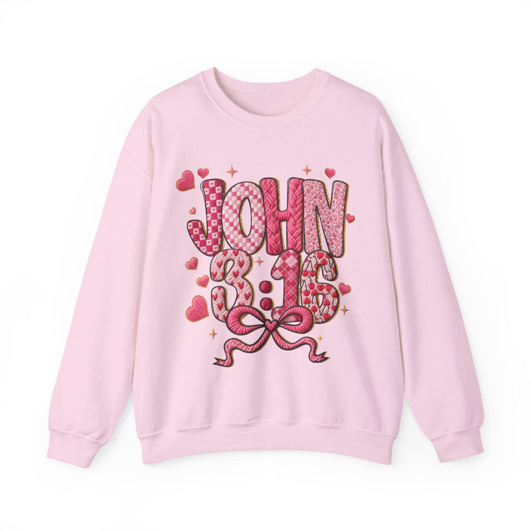 Light-pink 3:16 Crew sweatshirt with JOHN 3:16 in decorative letters, hearts, and sparkles. Cozy, loose fit with ribbed collar, ideal for comfort.