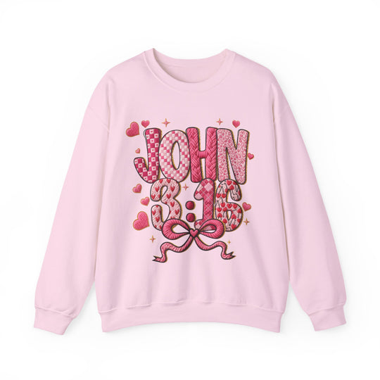 Light-pink 3:16 Crew sweatshirt with JOHN 3:16 in decorative letters, hearts, and sparkles. Cozy, loose fit with ribbed collar, ideal for comfort.