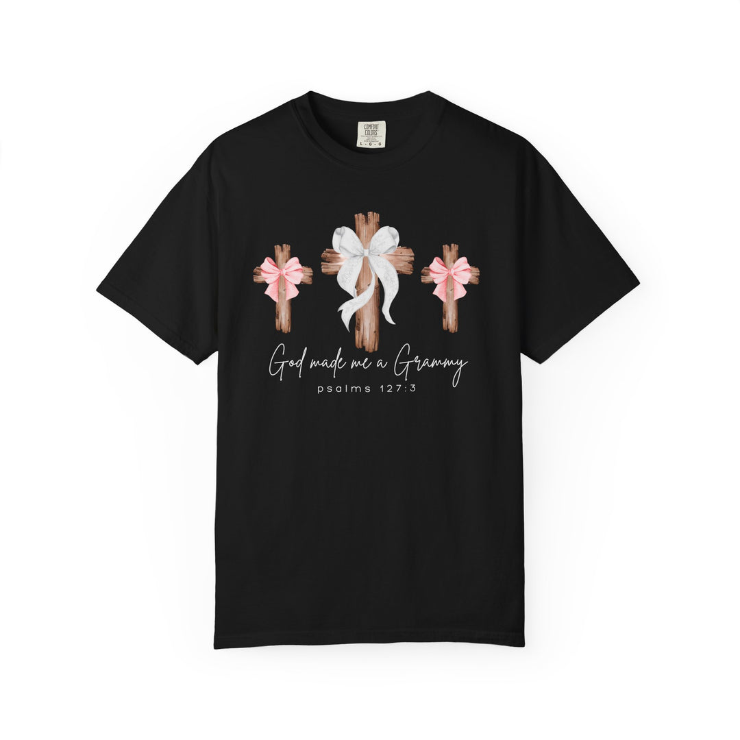 Black T-shirt with three rustic wooden crosses, “God made me a Grammy” text, and scripture reference. Part of Faith Family Designs' unique graphic tees collection.