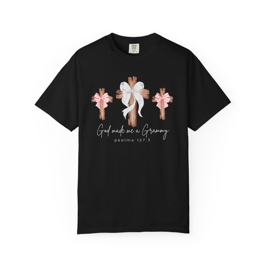 Black T-shirt with three rustic wooden crosses, “God made me a Grammy” text, and scripture reference. Part of Faith Family Designs' unique graphic tees collection.