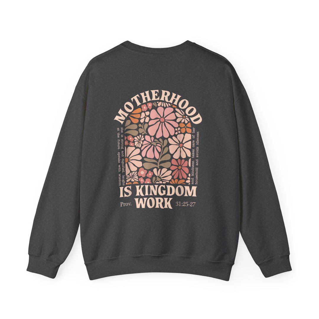 Motherhood Kingdom Work Crew sweatshirt features an arched floral graphic with biblical text, crafted for comfort with polyester-cotton blend and ribbed collar.