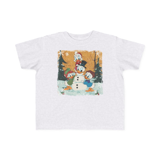 Duck Snowmen Toddler Tee featuring Donald Duck and nephews building a snowman in a snowy forest, perfect for toddlers with its soft, durable cotton fabric.