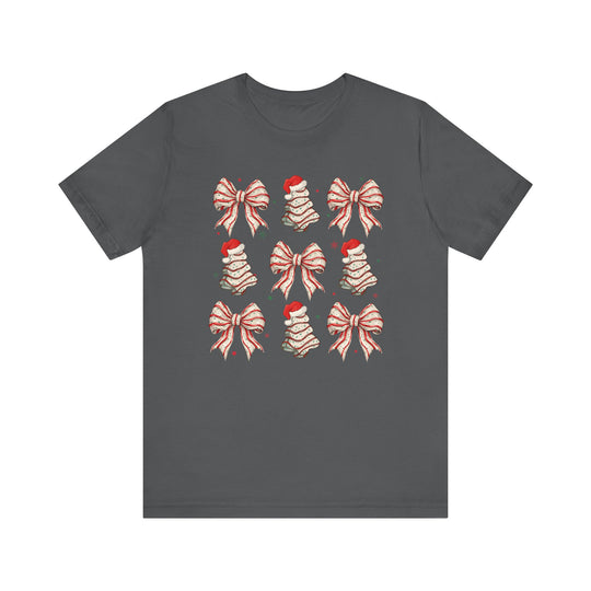 Charcoal Cookies and Bows Tee featuring a festive 3×3 grid of holiday motifs with red-and-white bows and vintage-style Christmas trees.