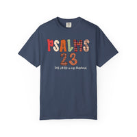 Navy-blue Psalms 23 Tee featuring patchwork-style letters and handwritten script, embodying comfort with a relaxed fit, ideal for faith-inspired casual wear.