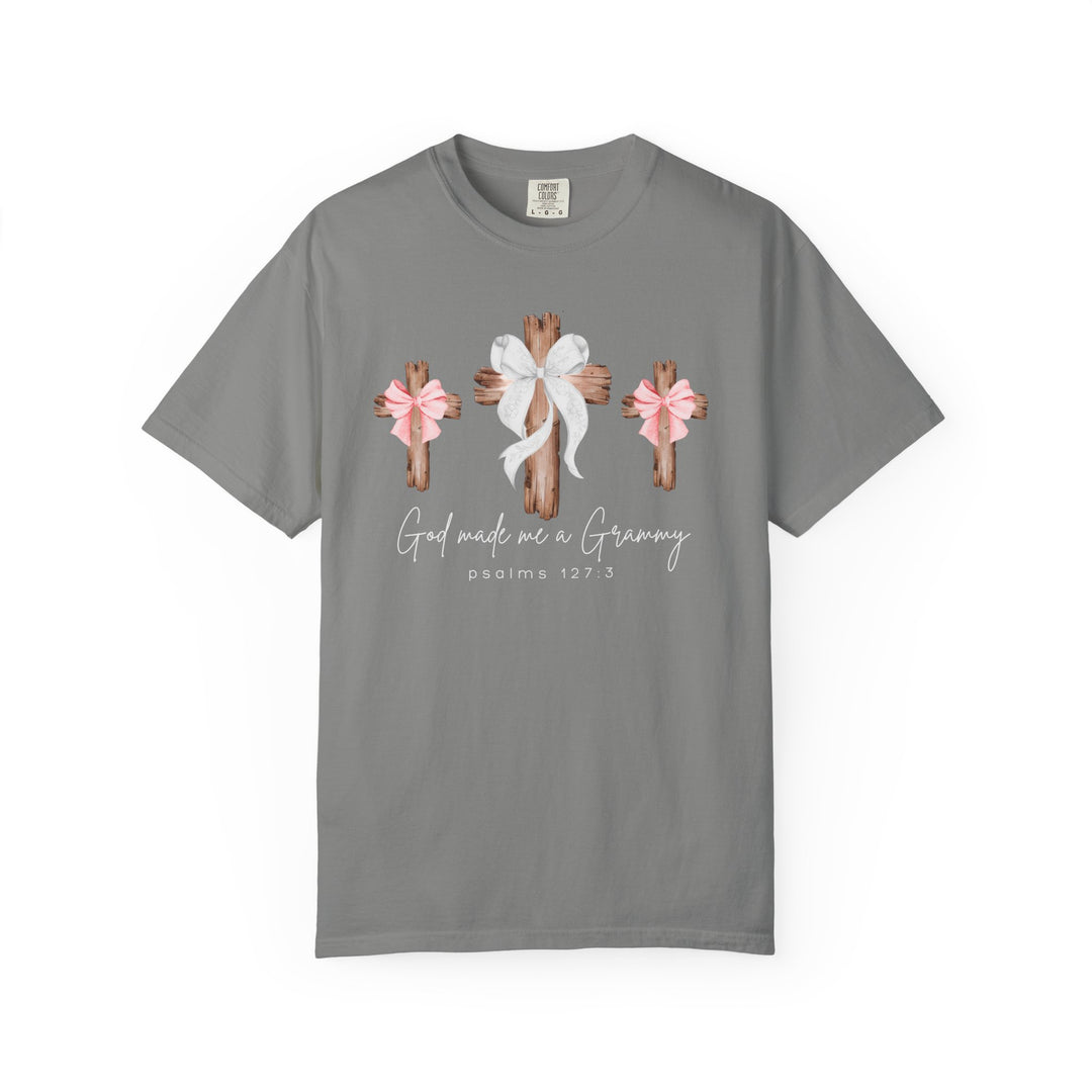 Gray God Made Me a Grammy tee with three wooden crosses, central with a white bow, side crosses with pink bows, script text below.