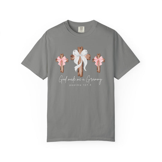 Gray God Made Me a Grammy tee with three wooden crosses, central with a white bow, side crosses with pink bows, script text below.