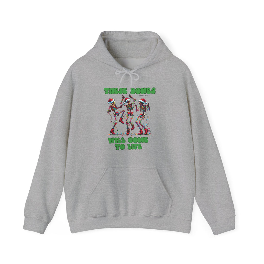 Bones Come to Life Hoodie featuring dancing skeletons in Santa hats with Christmas lights, green bubble text, and Ezekiel 37: 1-5 reference, ideal for festive warmth.