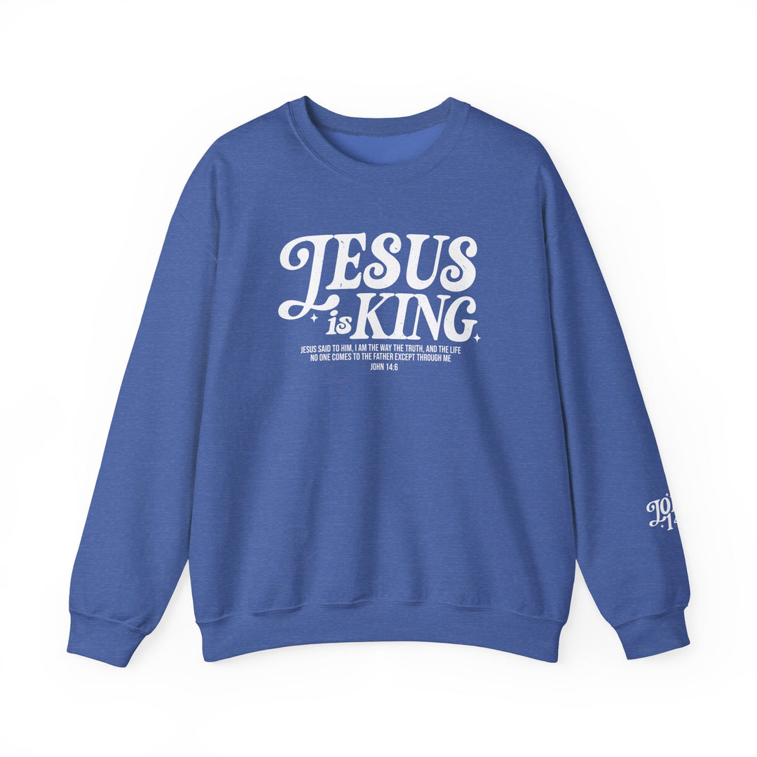 Jesus is King Crew: A blue sweatshirt featuring white text, ideal for comfort with its polyester-cotton blend and ribbed collar, available in various sizes.