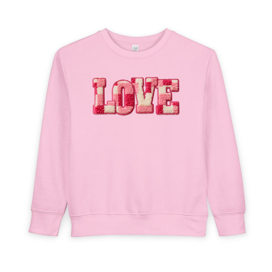 Light-pink Love Toddler Crew sweatshirt with chenille LOVE patch in pink, red, and cream shades, offering warmth and comfort for toddlers.