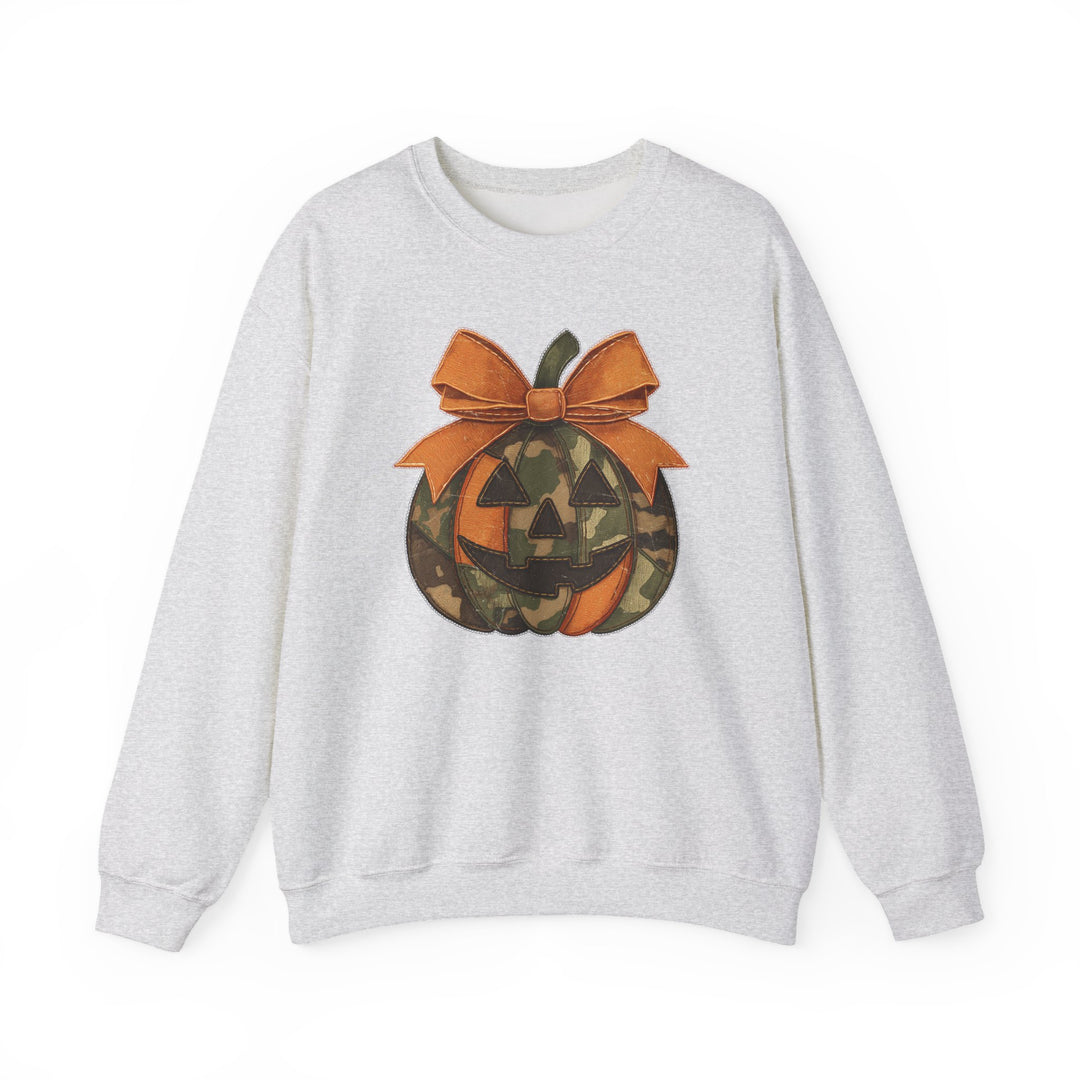 Light-gray Jackie O Crew sweatshirt with jack-o-lantern graphic; orange, camouflage panels, stitched detailing, topped with orange bow; relaxed fit with ribbed cuffs and hem.