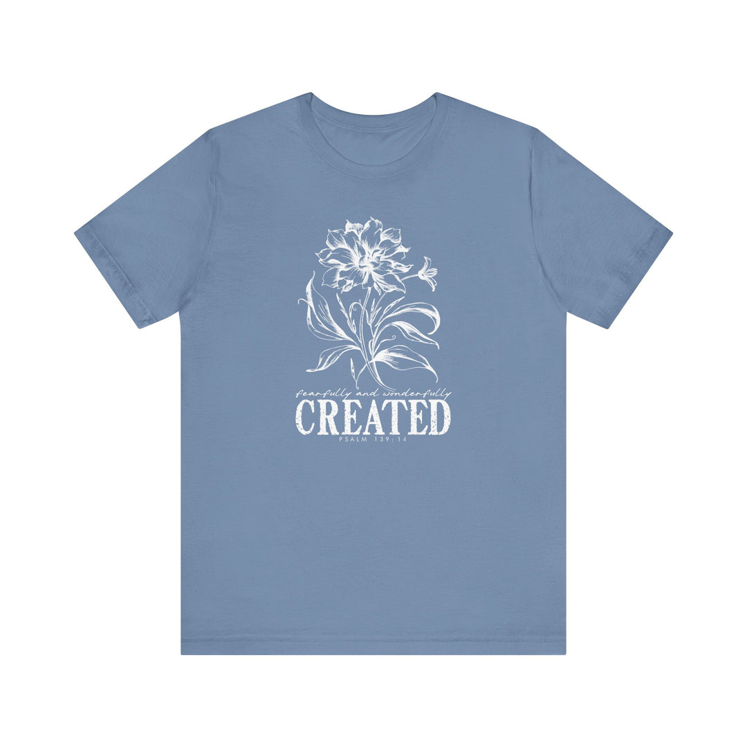 Unisex jersey short sleeve tee, Created Tee, with a classic crew neckline, soft cotton fabric, and ribbed knit collars for enhanced fit and durability.