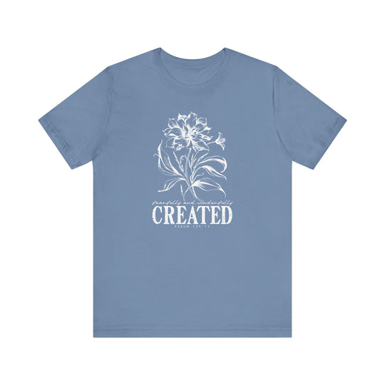 Unisex jersey short sleeve tee, Created Tee, with a classic crew neckline, soft cotton fabric, and ribbed knit collars for enhanced fit and durability.
