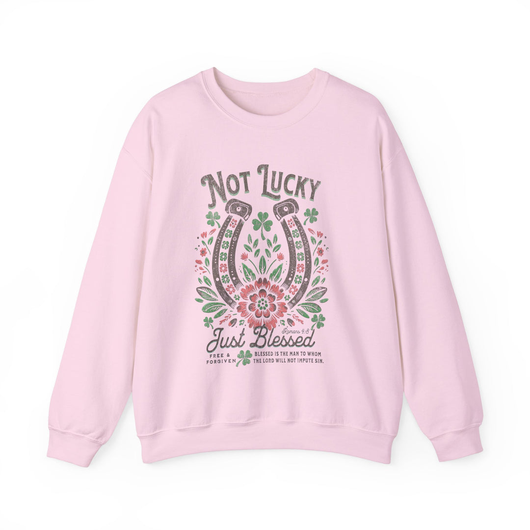 Pink Blessed Crew sweatshirt featuring a horseshoe and floral design, made from a comfortable polyester-cotton blend, ideal for casual wear.