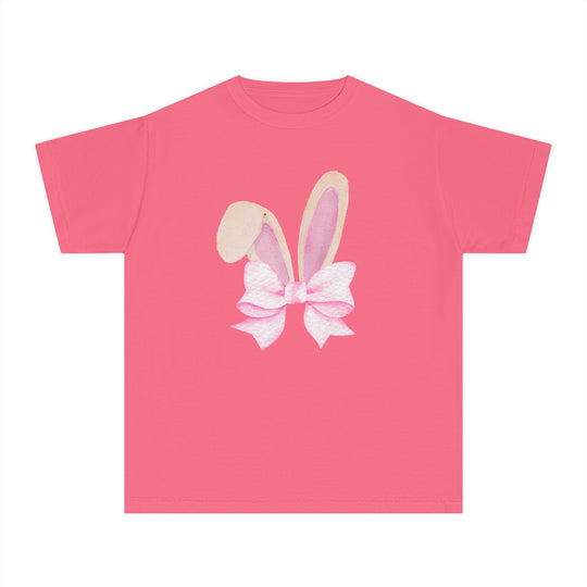 Bunny Bow Kids Tee: A plain pink T-shirt with watercolor-style bunny ears tied with a pale pink bow, designed for kid's comfort and daily wear.