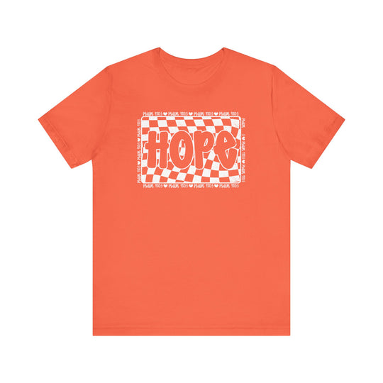 Hope Tee: Red t-shirt featuring a white and red design. Classic unisex fit, soft cotton, with ribbed knit collars and dual side seams for durability.