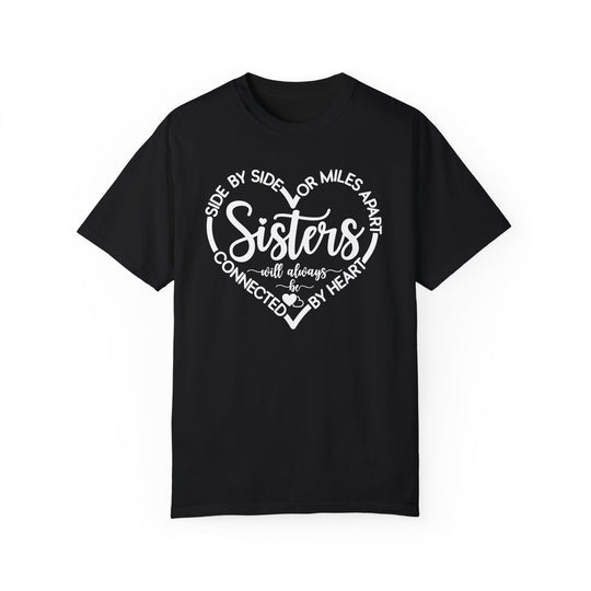 Sisters At Heart Tee: Black t-shirt with white text, made of 100% ring-spun cotton, featuring a relaxed fit and durable double-needle stitching.