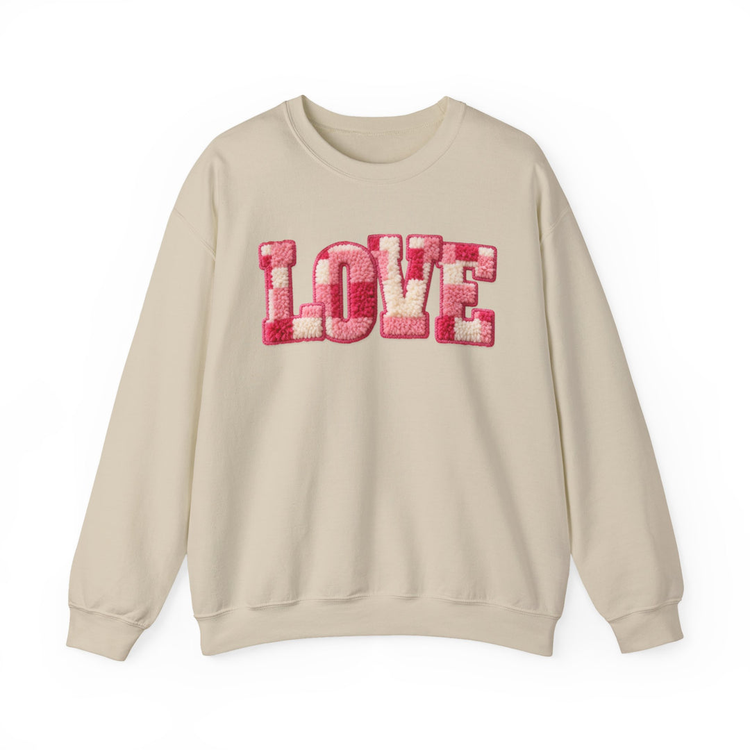 Love Crew sweatshirt with 'LOVE' in fuzzy pink and off-white patches, featuring a ribbed collar and loose fit, from Faith Family Designs.