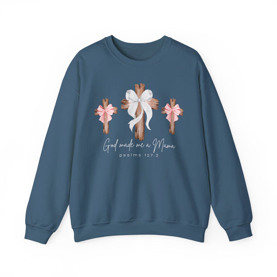 Slate-blue crewneck sweatshirt featuring three wooden crosses with bows and the text “God made me a Mama,” referencing Psalms 127:3.