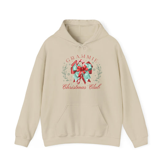 Grammie Christmas Club Hoodie featuring festive candy canes and holly design on the chest, with kangaroo pocket and color-matched drawstring, ideal for cozy holiday wear.