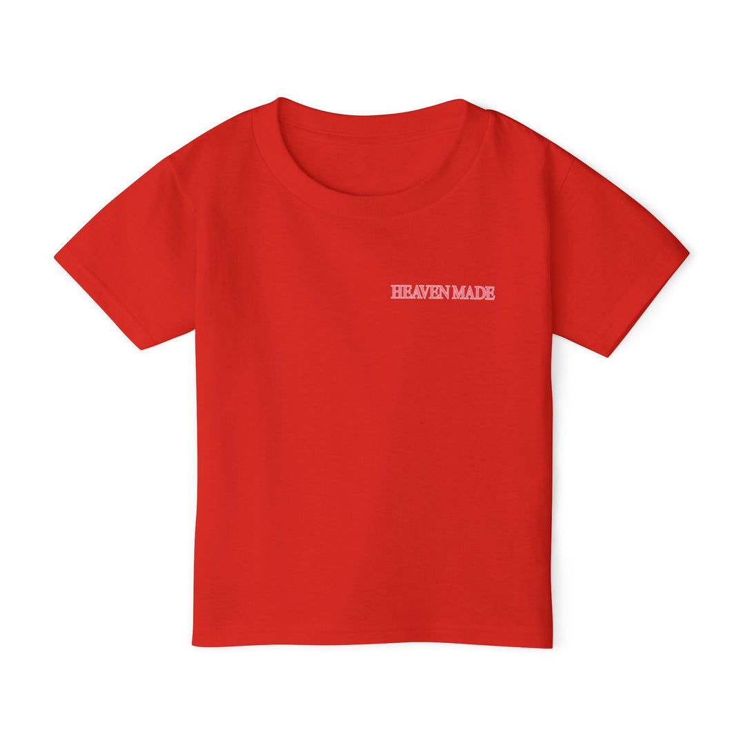 Heavy Cotton™ Toddler T-shirt, red with HEAVEN MADE in white on chest, offers comfort and eco-friendly style, crafted from 100% cotton for softness.