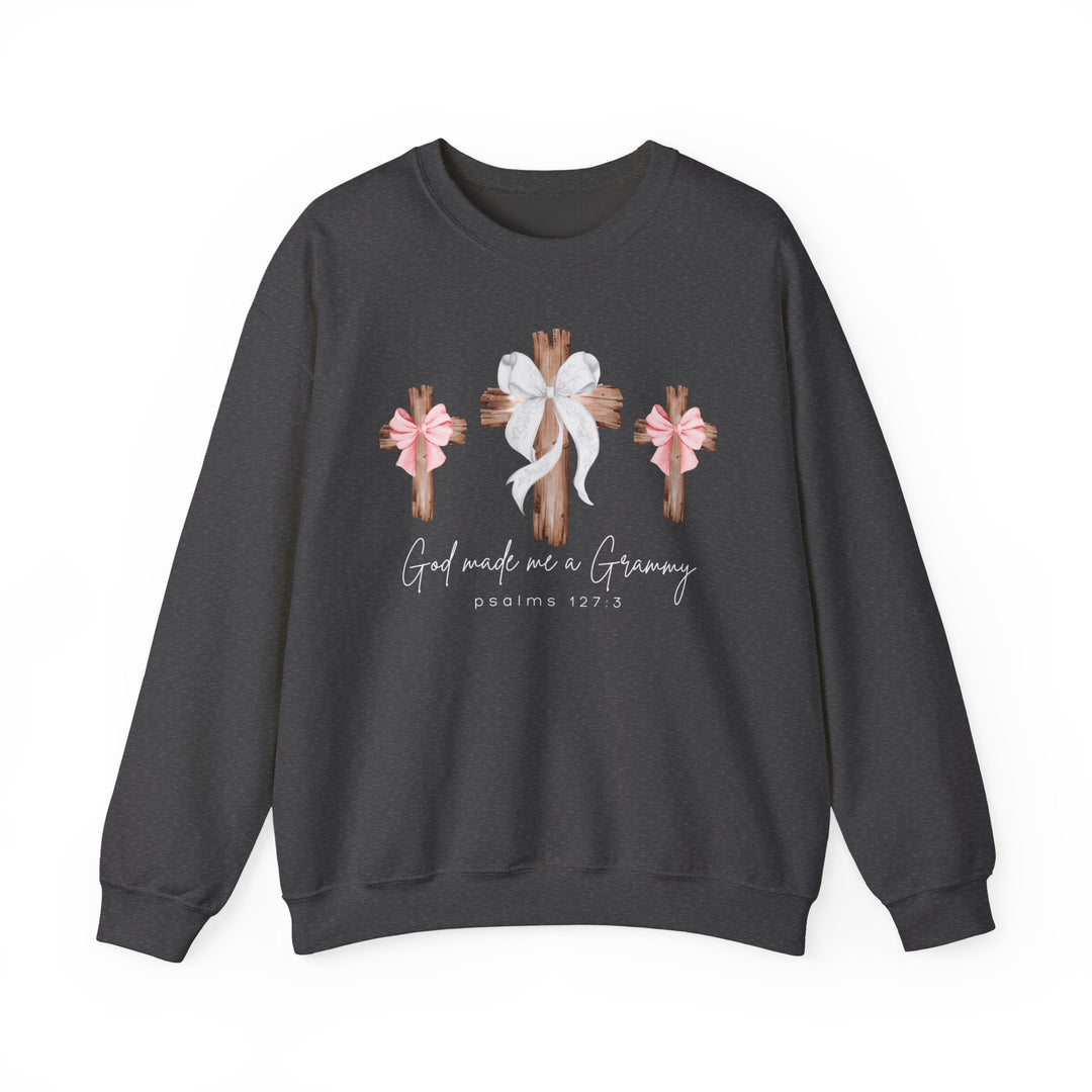 Dark-charcoal crewneck sweatshirt featuring three wooden crosses with bows and God made me a Grammy motto, designed by Faith Family Designs.