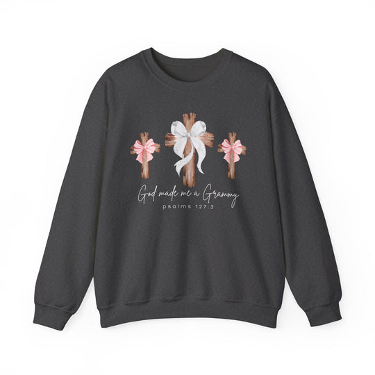 Dark-charcoal crewneck sweatshirt featuring three wooden crosses with bows and God made me a Grammy motto, designed by Faith Family Designs.