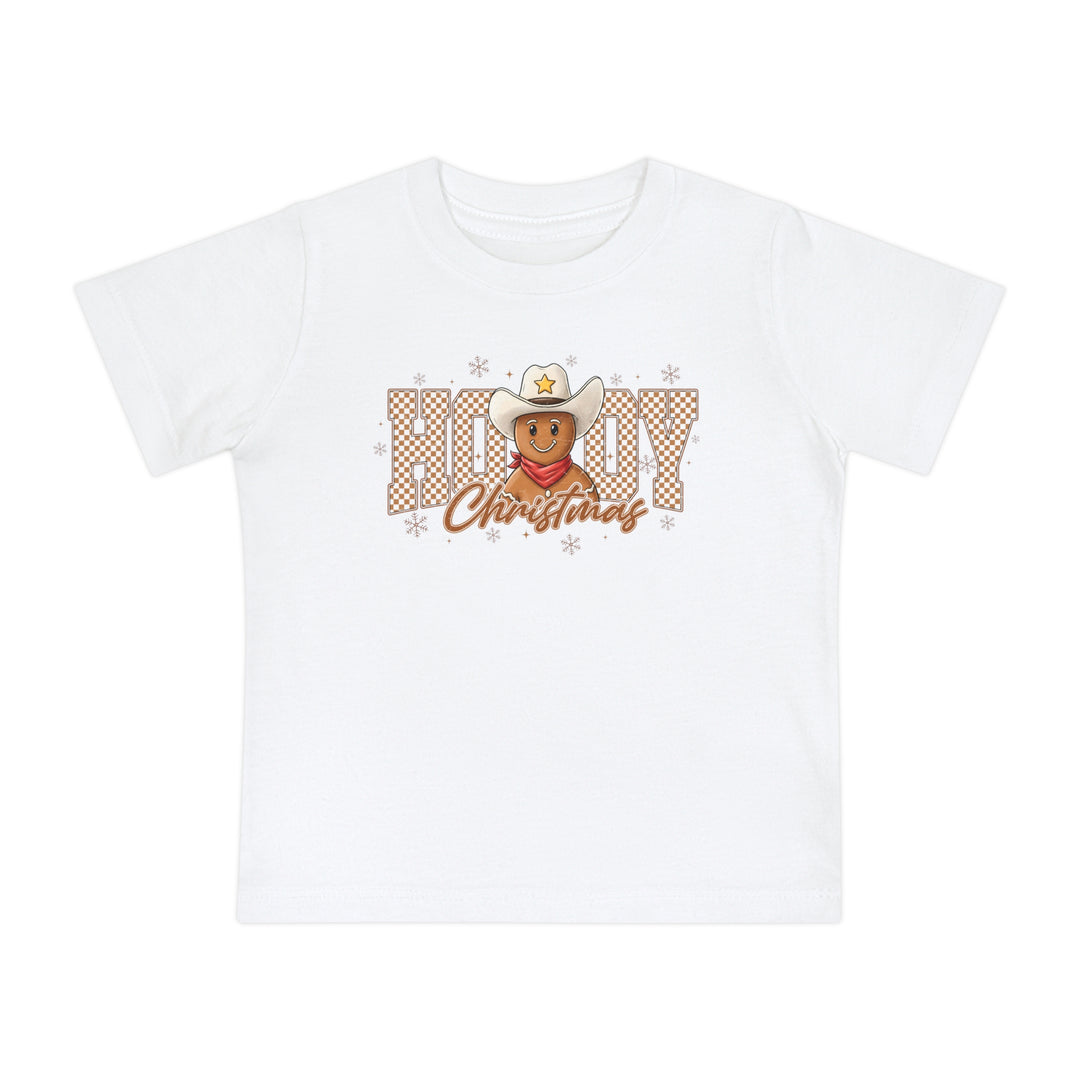 Howdy Christmas Baby Tee featuring a gingerbread cowboy with a hat and bandana, surrounded by HOWDY letters and snowflakes, on soft pre-shrunk cotton.