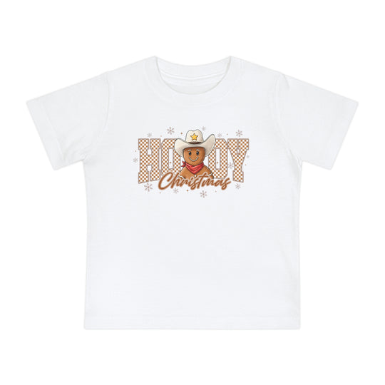 Howdy Christmas Baby Tee featuring a gingerbread cowboy with a hat and bandana, surrounded by HOWDY letters and snowflakes, on soft pre-shrunk cotton.