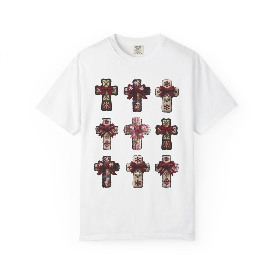 Crosses Tee: A white, crew-neck T-shirt featuring a 3x3 grid of ornament-style crosses with snowflake motifs and red ribbon bows.