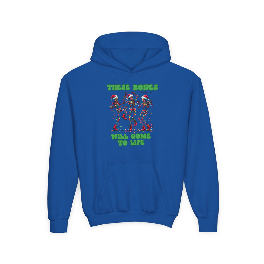Youth hoodie featuring festive skeletons in Santa hats with Christmas lights, graphic text THESE BONES WILL COME TO LIFE, on royal-blue, ultra-soft fleece with kangaroo pocket.