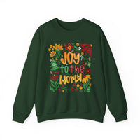 Dark-green crew-neck sweatshirt with festive Joy to the World design, featuring colorful lettering and holiday motifs like flowers, holly, candy canes, and Christmas trees.