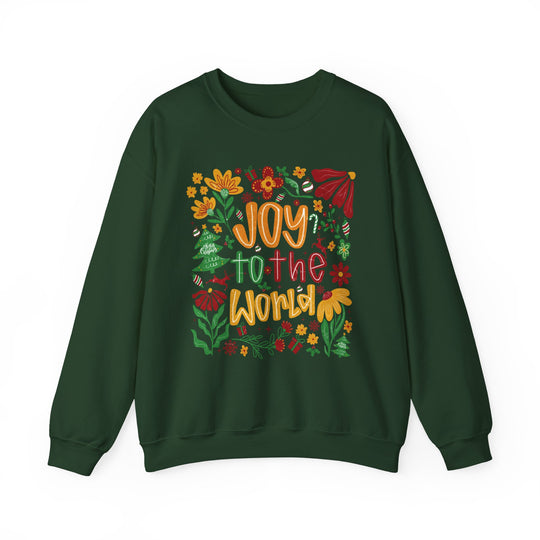 Dark-green crew-neck sweatshirt with festive Joy to the World design, featuring colorful lettering and holiday motifs like flowers, holly, candy canes, and Christmas trees.