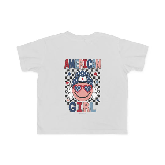 American Girl Toddler Tee featuring a cartoon face with sunglasses and a hat, perfect for sensitive skin. 100% combed ringspun cotton, light fabric, tear-away label, classic fit. Available in sizes 2T to 5-6T.