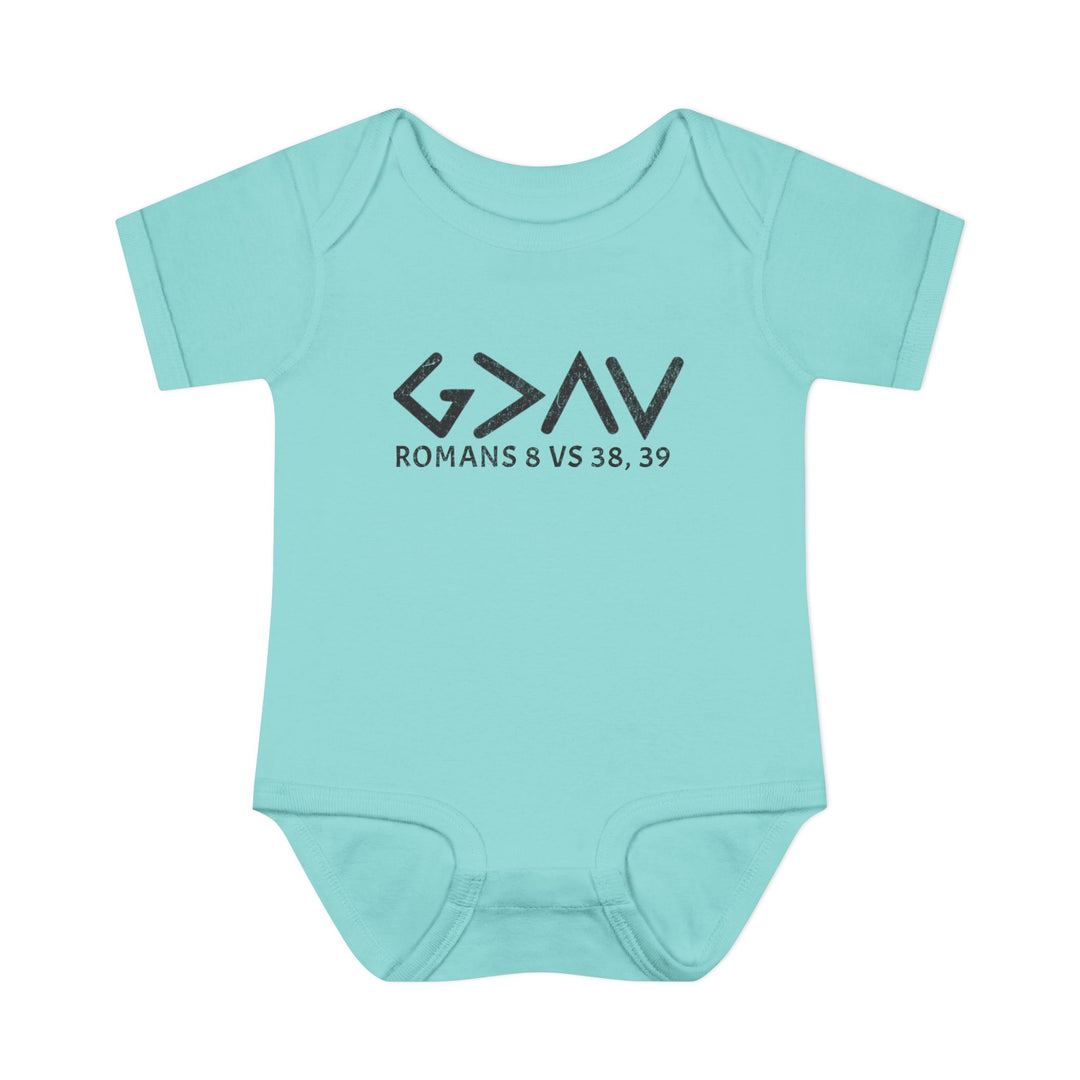 God is Greater Onesie: Soft blue baby bodysuit with black text, featuring lap shoulders and made from 100% combed ringspun cotton, ideal for infants' comfort and ease.