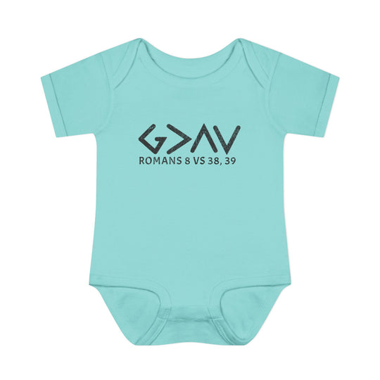 God is Greater Onesie: Soft blue baby bodysuit with black text, featuring lap shoulders and made from 100% combed ringspun cotton, ideal for infants' comfort and ease.
