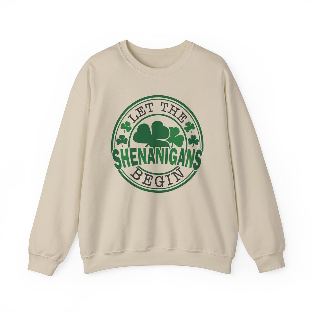 Let the Shenanigans Begin Day Crew sweatshirt with green circle and clover design, featuring ribbed collar and comfortable polyester-cotton blend.