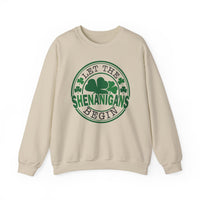 Let the Shenanigans Begin Day Crew sweatshirt with green circle and clover design, featuring ribbed collar and comfortable polyester-cotton blend.