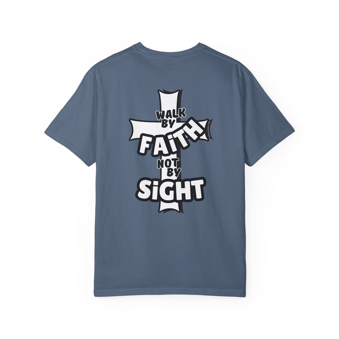 A Walk By Faith Not By Sight Tee, a back view of a garment-dyed t-shirt with a cross and white text. Made of 100% ring-spun cotton, featuring a relaxed fit and durable double-needle stitching.