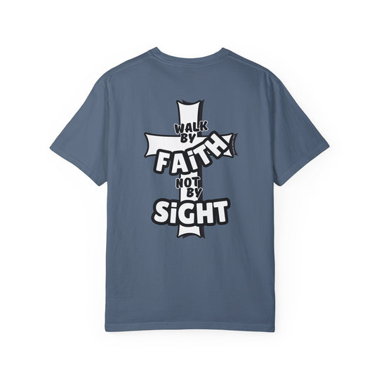 A Walk By Faith Not By Sight Tee, a back view of a garment-dyed t-shirt with a cross and white text. Made of 100% ring-spun cotton, featuring a relaxed fit and durable double-needle stitching.