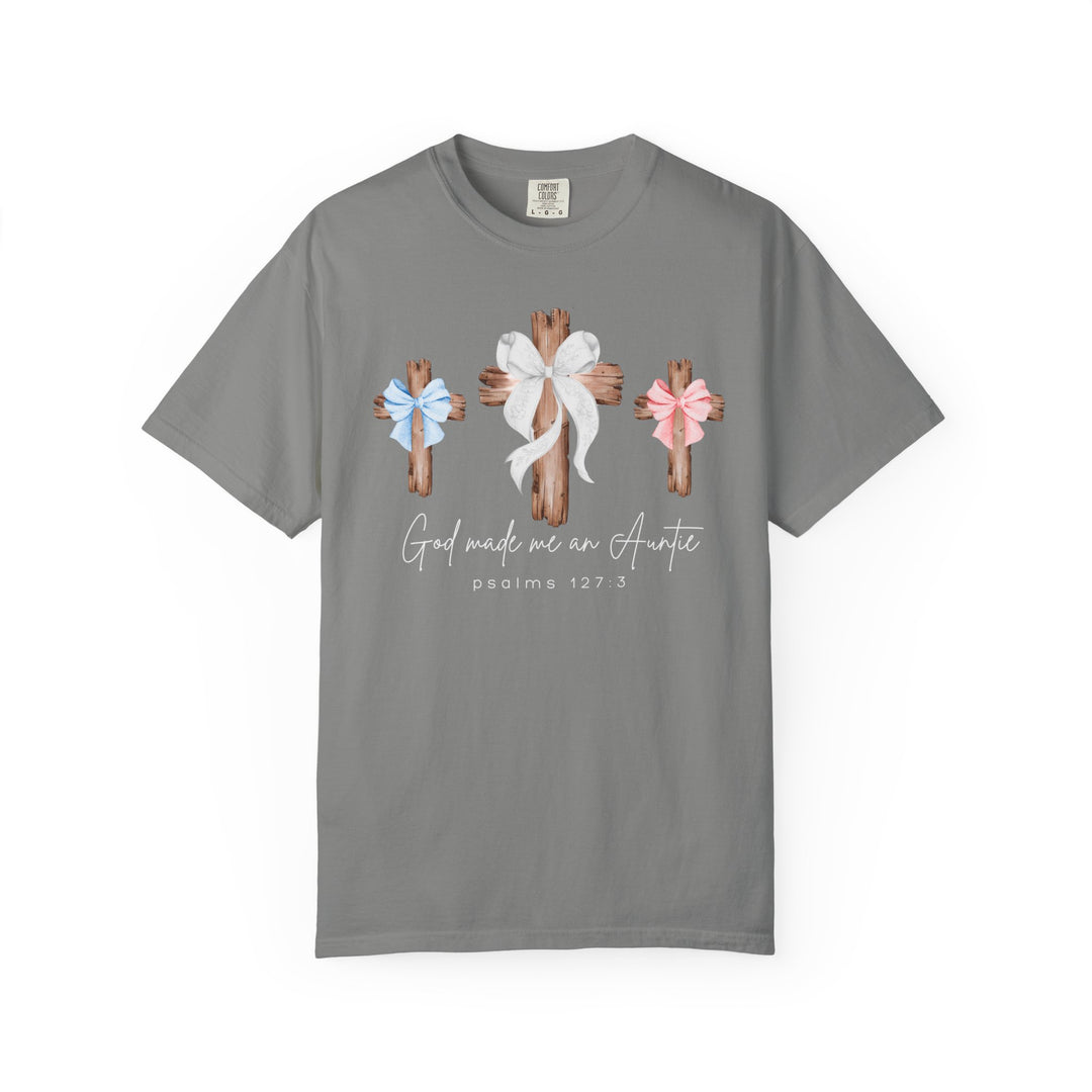 Heather-grey T-shirt with three rustic wooden crosses, adorned with bows, and the phrase God Made Me an Auntie in script, featuring Psalms 127:3.
