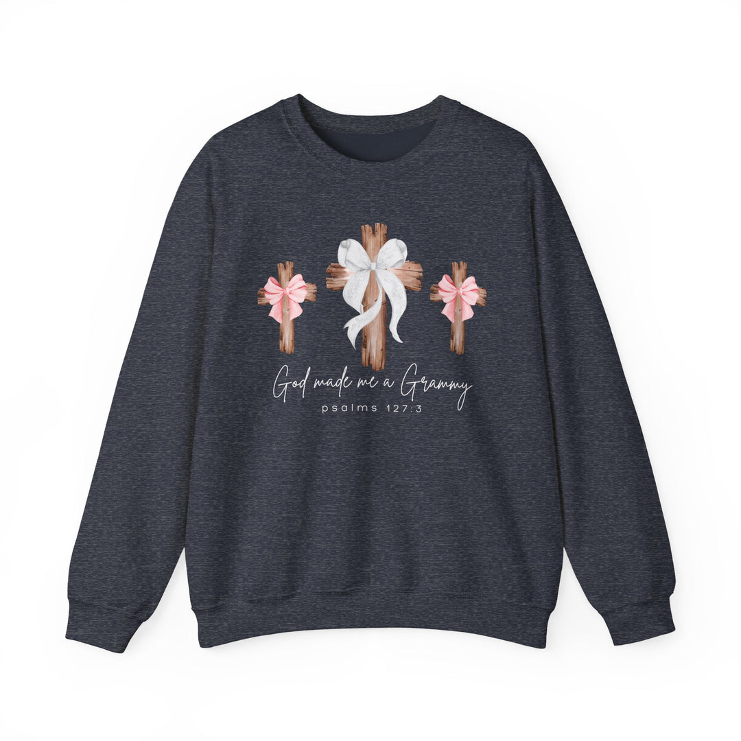 God Made Me a Grammy Crew sweatshirt featuring three wooden crosses with bows and “Psalms 127:3.” Crafted from poly-cotton blend for comfort and durability.