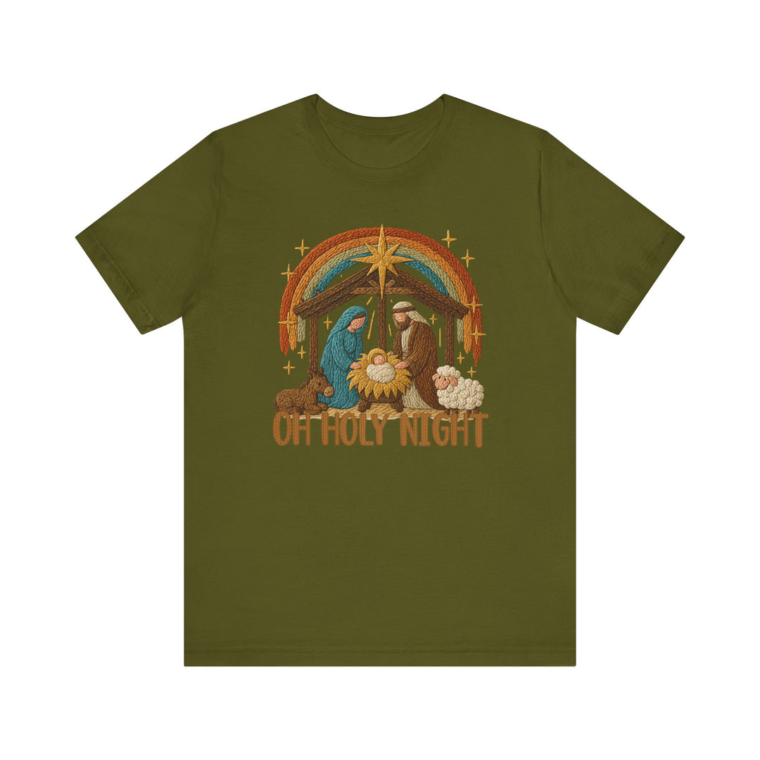 Oh Holy Night Tee featuring a yarn-like nativity scene with Mary, Joseph, baby Jesus, donkey, sheep, star, and rainbow. Unisex, soft cotton, classic fit.