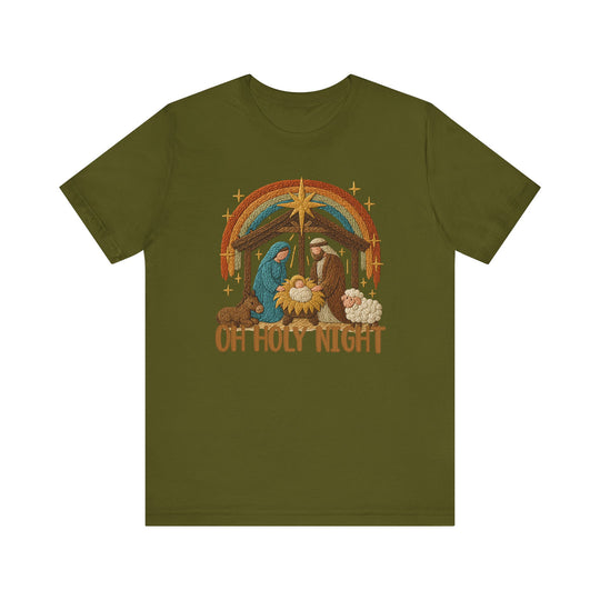 Oh Holy Night Tee featuring a yarn-like nativity scene with Mary, Joseph, baby Jesus, donkey, sheep, star, and rainbow. Unisex, soft cotton, classic fit.
