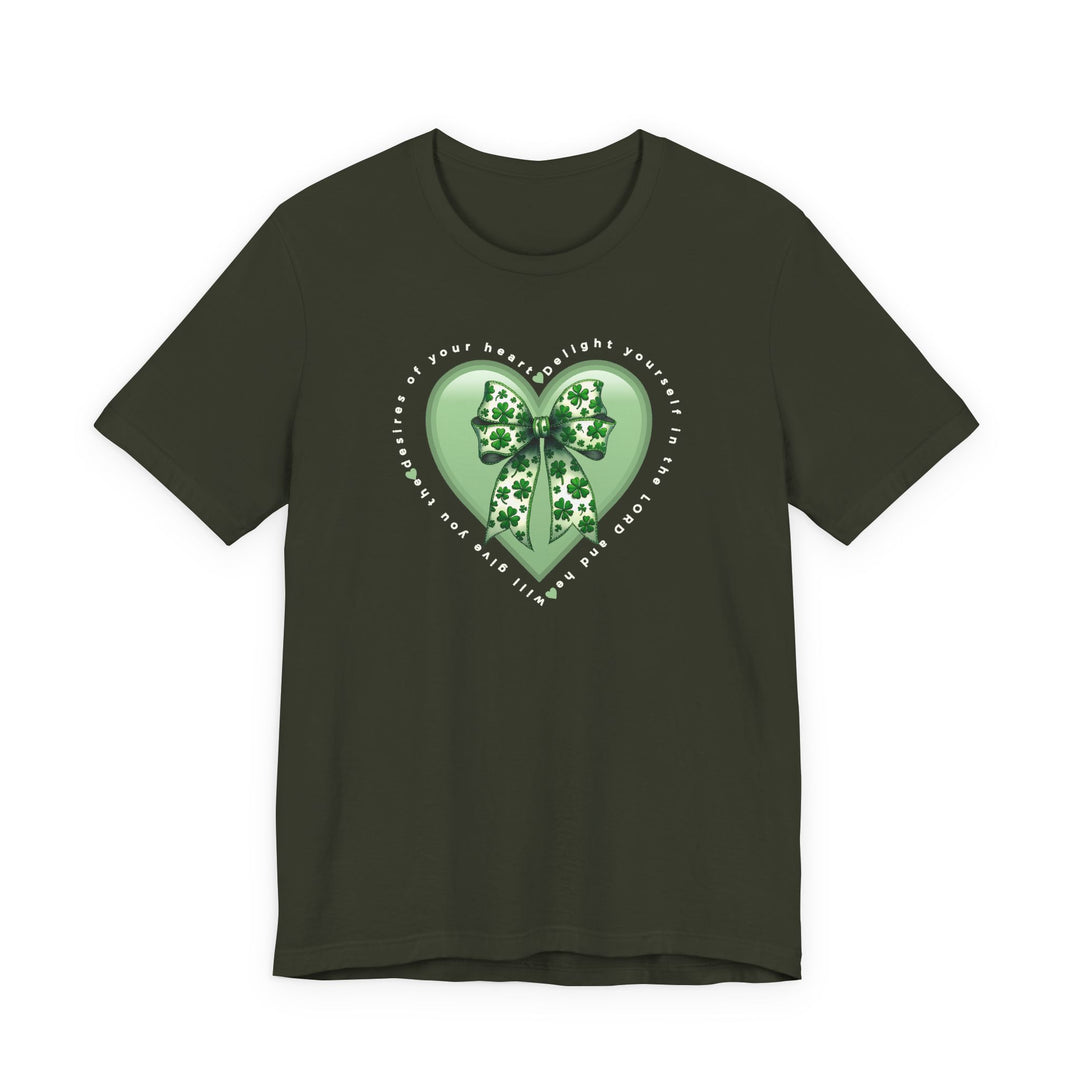 Delight in the LORD Tee: Olive T-shirt featuring a pale-green heart with shamrock bow, Psalm 37:4 quote encircling it, in soft, durable cotton.