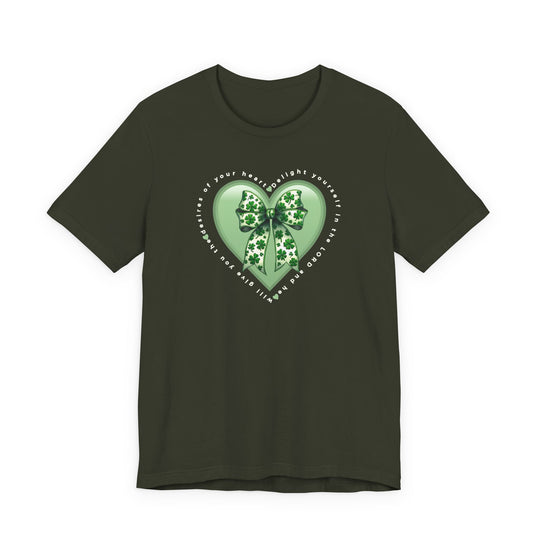 Delight in the LORD Tee: Olive T-shirt featuring a pale-green heart with shamrock bow, Psalm 37:4 quote encircling it, in soft, durable cotton.