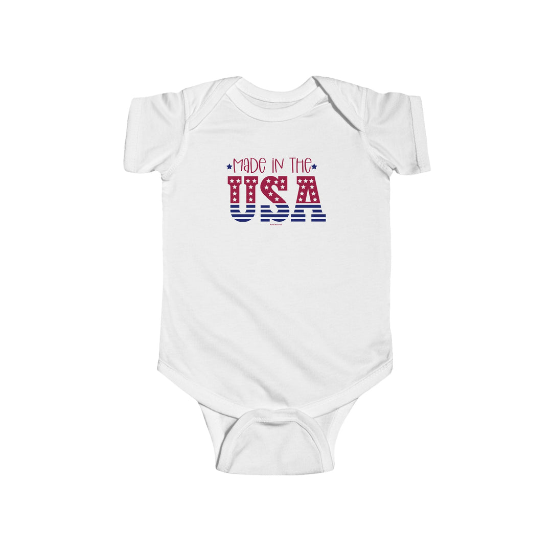 A white baby bodysuit with red and blue text, featuring a Made in the USA Onesie by Worlds Worst Tees. 100% cotton fabric, ribbed knit bindings, and plastic snaps for easy changing access.