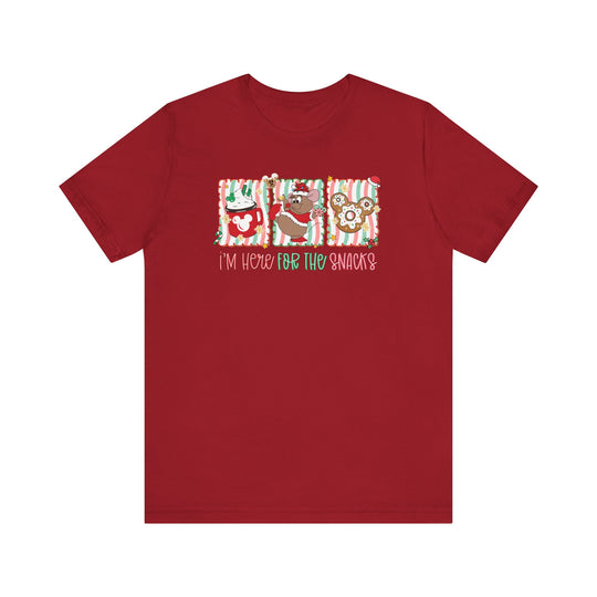Here for the Snacks Tee features festive candy-cane graphics, Mickey-themed icons, and playful slogan. Unisex fit with soft cotton for comfort.