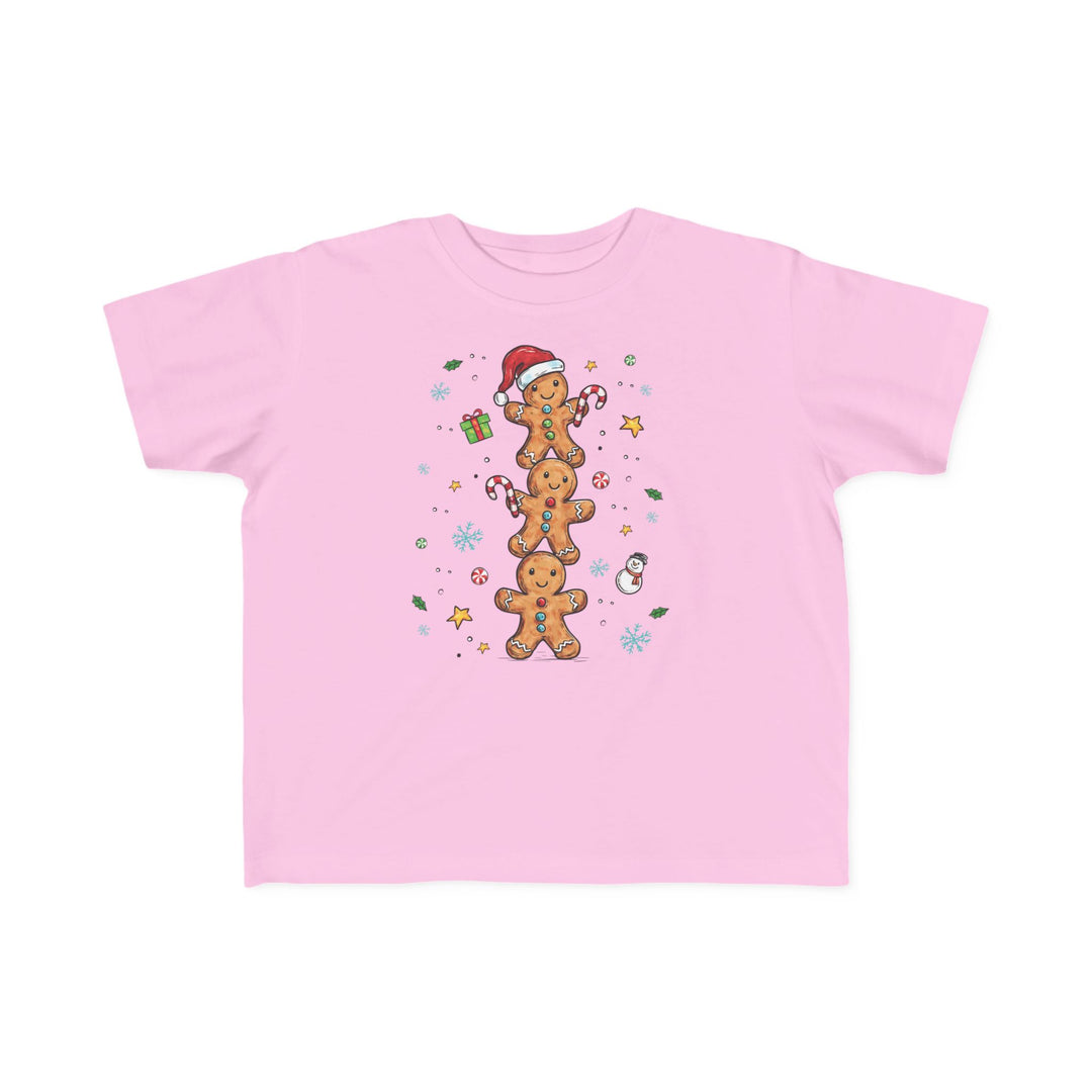 Gingerbread Stack Toddler Tee features festive gingerbread cookies and holiday doodles, perfect for toddlers. Soft cotton, durable print, ideal for sensitive skin.
