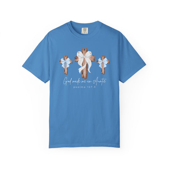 Cornflower-blue “God Made Me a Boy Auntie Tee” with rustic wooden crosses, bows, and script-style text. Comfortable, durable, garment-dyed 100% cotton. Available in multiple sizes.